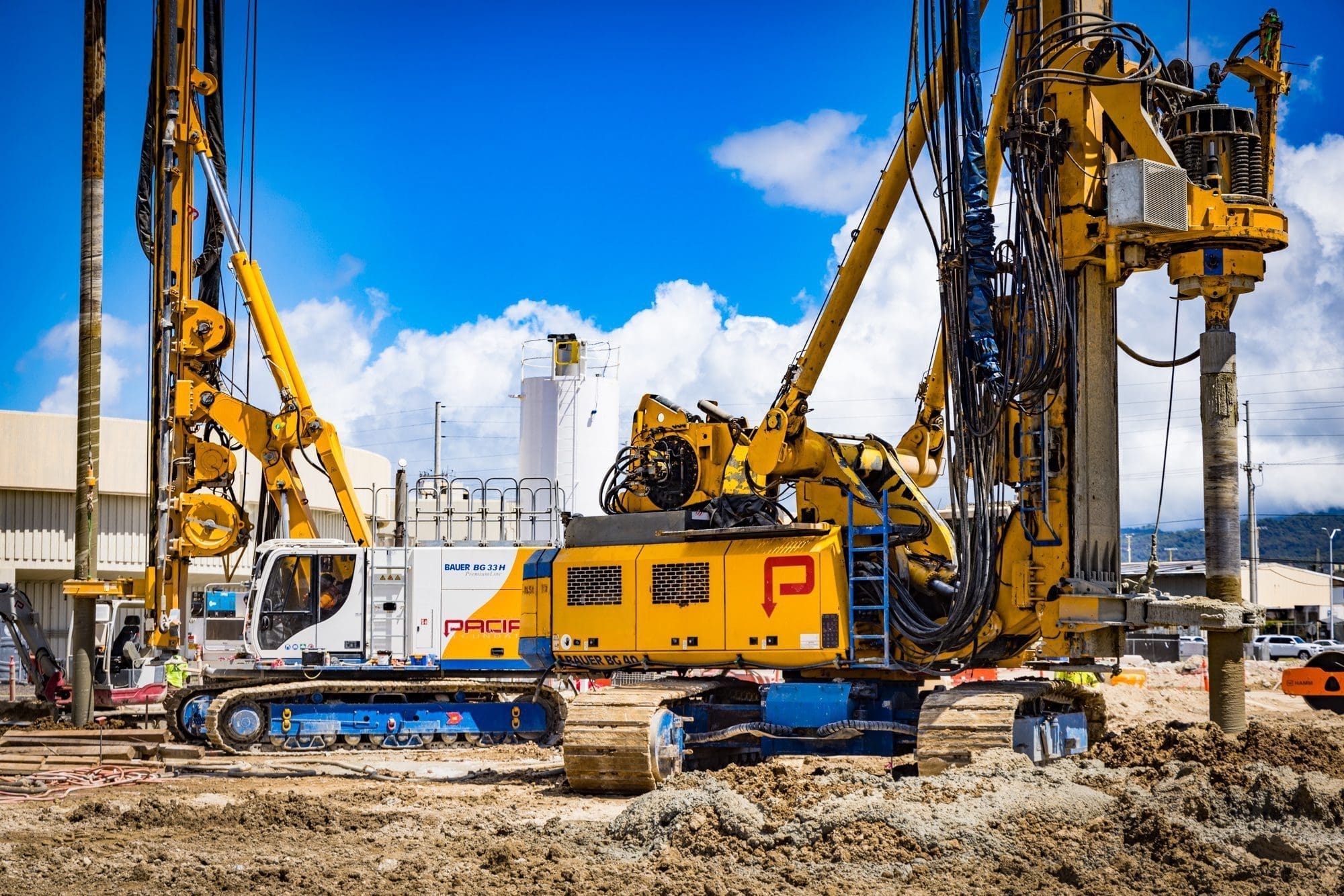 Vertical Drill rigs fitted with large diameter cement mixing tools install a bottom seal at Sand Island WWTP in Honolulu, HI