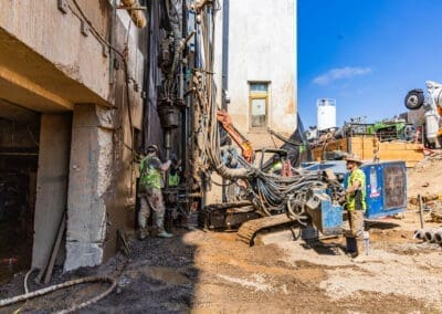 A Hutte micropiling rig installs micropiles next to the South wall of the Oregon Capitol building