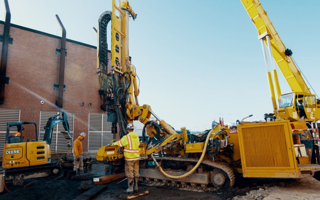 Pacific Foundation works at the Portland International Airport. The crew is installing micropiles for a parking garage using a Klemm small diameter drill rig.