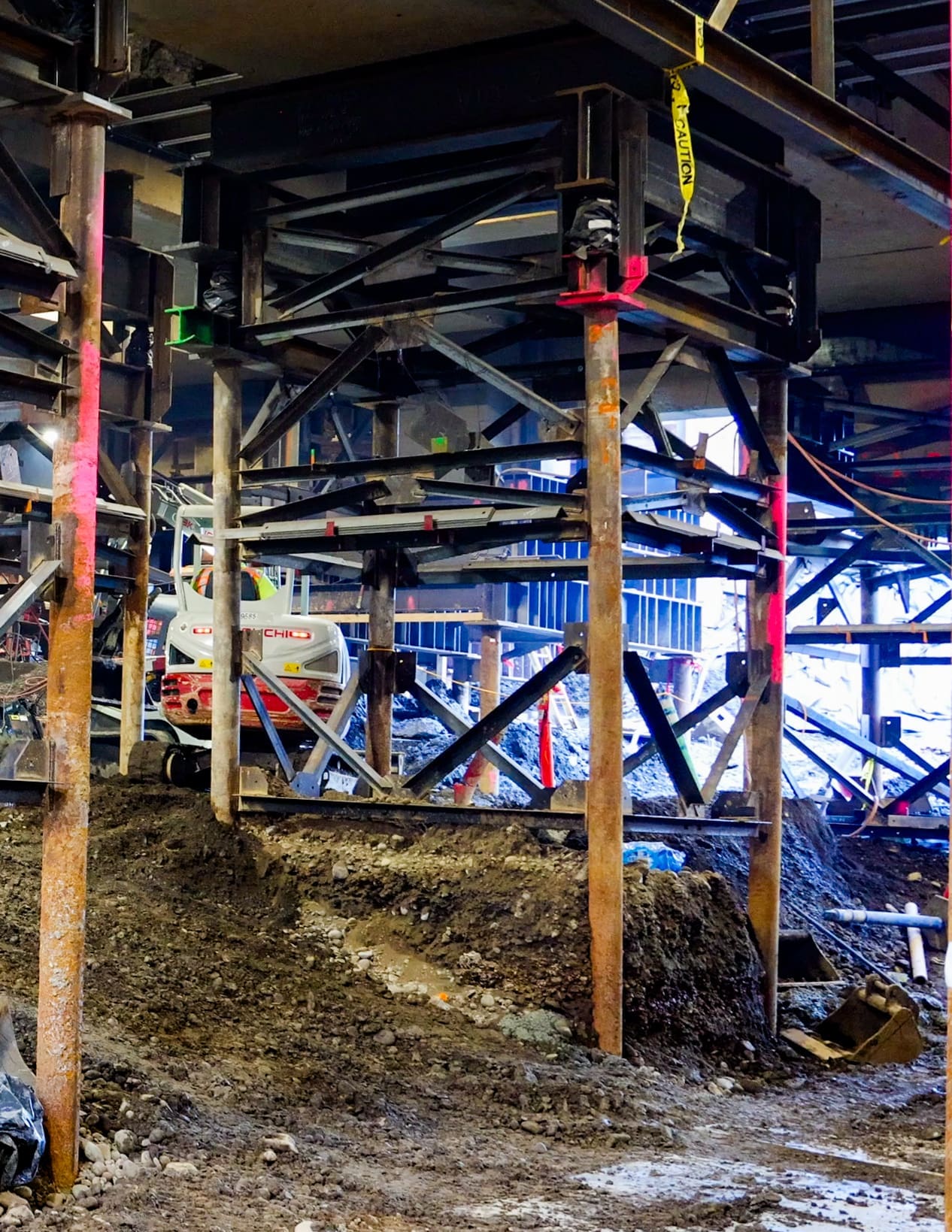 Steel towers and micropiles support a building undergoing seismic upgrades